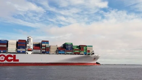 SAVANNAH, GEORGIA - March 4, 2019: Large Post Panamax Container Ship Stock Footage 123737666
