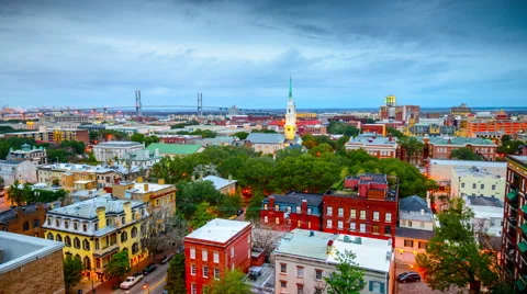 Savannah, Georgia, USA downtown city skyline from day to night. Stock Footage