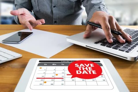 SAVE THE DATE message on a calendar Foto stock
