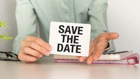 SAVE THE DATE message on the card shown by a woman, Business Concept. Stock Photos