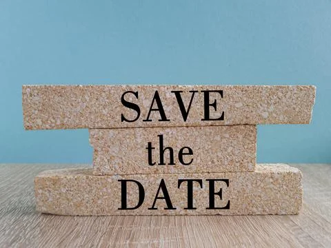 SAVE THE DATE symbol. Brick blocks with phrase SAVE THE DATE. Stock Photos