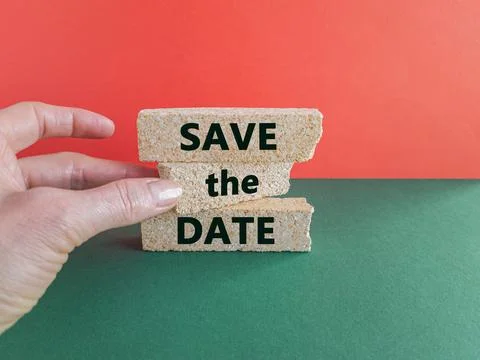 SAVE THE DATE symbol. Concept words SAVE THE DATE on brick blocks. Stock Photos