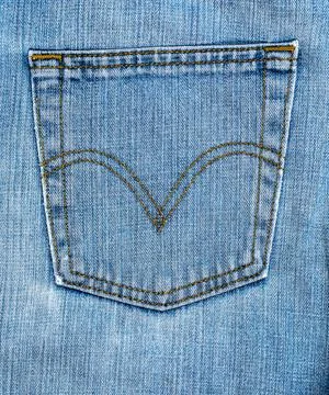 Save Download Preview Blue background, denim jeans background. Jeans texture  Fotos de archivo