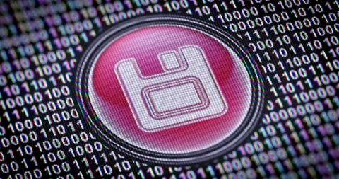 Save icon. Binary code ( array of bits ) in the screen. Looping footage Stock Footage 111174499