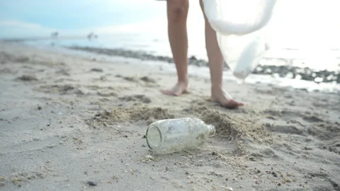Save ocean. Volunteer pick up trash garbage at the beach and plastic bottle.. Stock Footage 336065616
