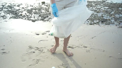 Save ocean. Volunteer pick up trash garbage at the beach and plastic bottle.. Stock Footage 336560705