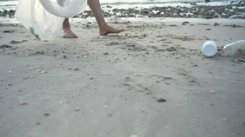 Save ocean. Volunteer pick up trash garbage at the beach and plastic bottle.. Stock Footage 336729853