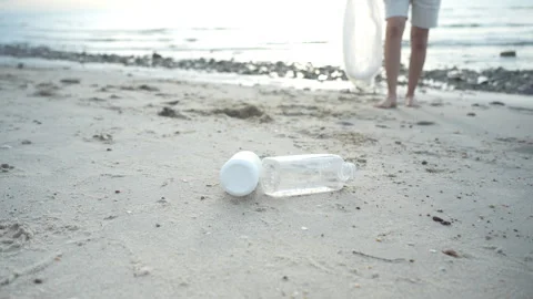 Save ocean. Volunteer pick up trash garbage at the beach and plastic bottle.. Stock Footage 339374998
