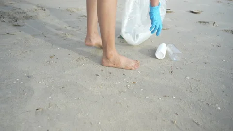 Save ocean. Volunteer pick up trash garbage at the beach and plastic bottle.. Stock Footage 339758732