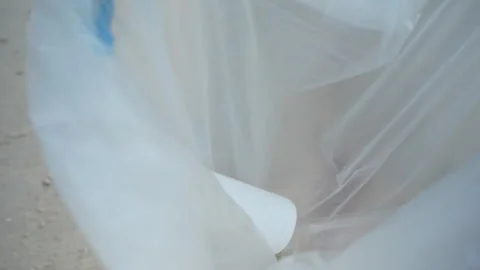 Save ocean. Volunteer pick up trash garbage at the beach and show plastic b.. Stock Footage 340240366