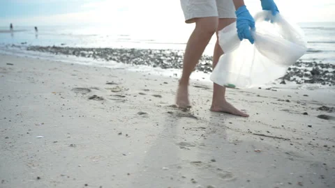 Save ocean. Volunteer pick up trash garbage at the beach and plastic bottle.. Stock Footage 341306168