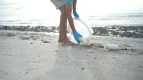 Save ocean. Volunteer pick up trash garbage at the beach and plastic bottle.. Stock Footage 341452005