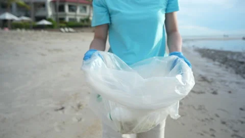 Save ocean. Volunteer pick up trash garbage at the beach and plastic bottle.. Stock Footage 341536609
