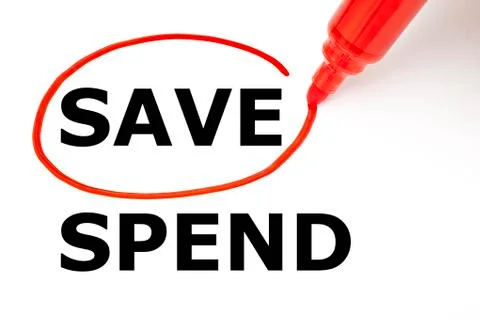 Save or spend with red marker 库存照片