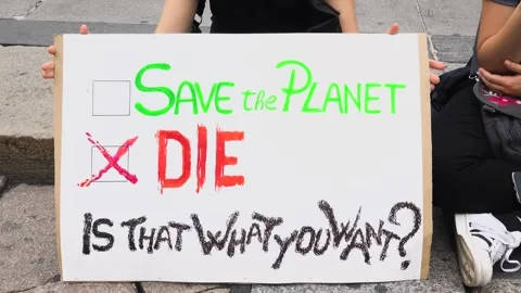 "Save the planet or die, is that what you want?" sign at Fridays for future 動画素材 266818065
