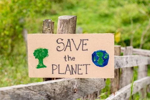 SAVE THE PLANET, poster asking to save our planet isolated on a natural Stock Photos