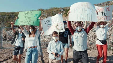 Save the Planet. View of fighting inspired young people in masks and invocatory Stock Footage 113925970