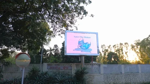 Save water save planet awareness led signboard on street Stock Footage 128122384