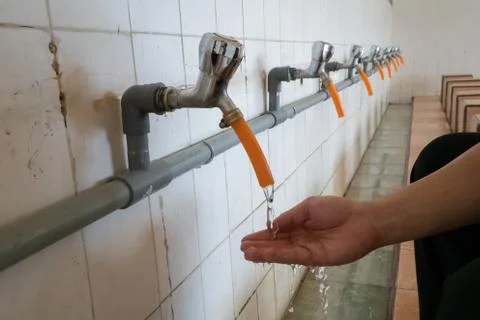 Save the water when use. Stock Photos