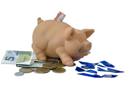 Saving concept. Broken card. Copy space. Piggy bank. Stock Photos