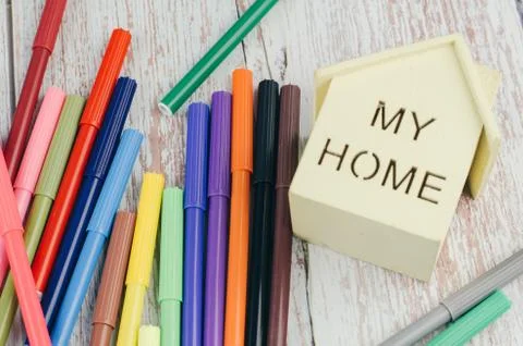 Saving for education or back to school concept, home replica and colorful mar Foto stock