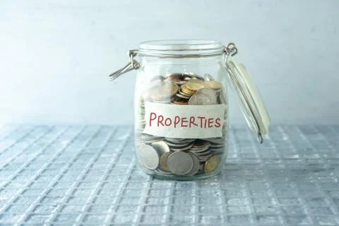 Saving jar with coins Stock-Fotos