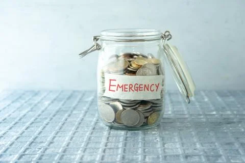 Saving jar with coins Stock Photos