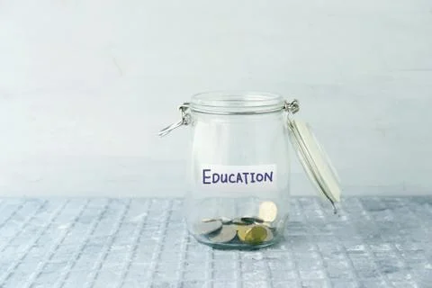 Saving jar with coins Stock Photos