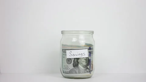 Saving money concept. Accumulate box. Piggy bank. Us dollar jar. Budget planning Stock Footage 294932063