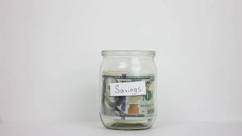 Saving money concept. Accumulate box. Piggy bank. Us dollar jar. Budget planning Stock Footage 294932139
