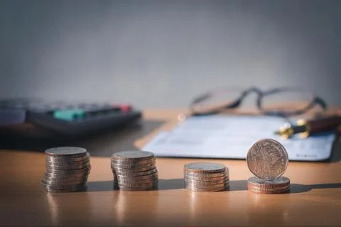 Saving money concept  coin stack growing business Stock Photos