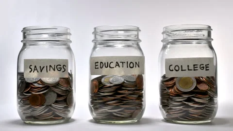 Saving money for multiple purpose - stop motion Stock Footage 137709034