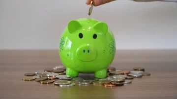 Saving With Piggy Bank Stock Footage 85647658