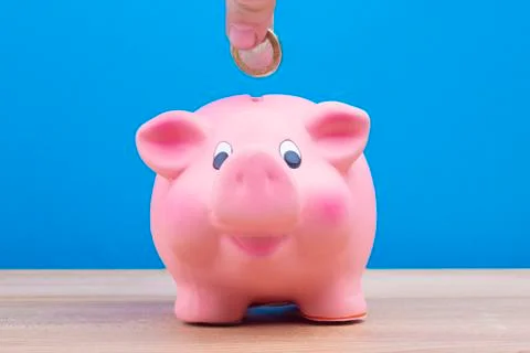 Saving for Retirement in a Piggy bank Stock Photos