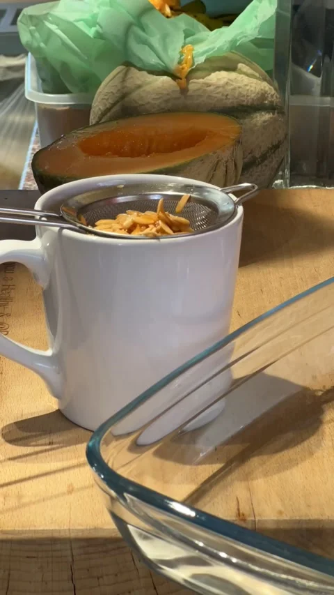 Saving seeds and cutting melon timelapse Stock Footage 241509945