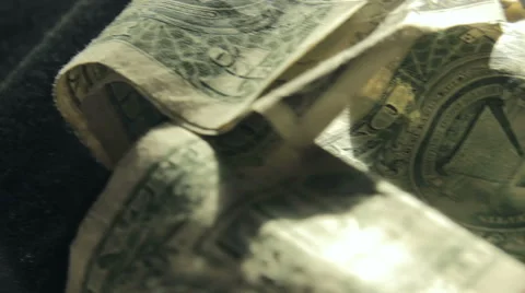 Saving Up, A small collection of dollar bills. Stock-Footage 44916736