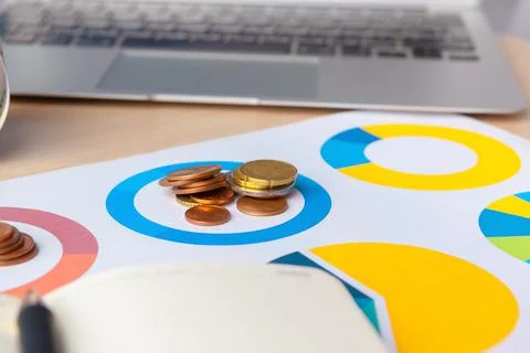 Saving stack coins money concept. Graph, chart document close up Stock Photos