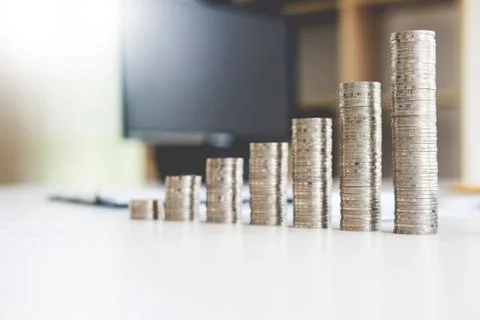 Saving stack coins money  for growing your business concept,graph,chart docum Stock Photos