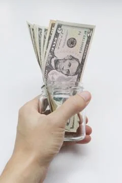 Saving the US dollar on a white background Stock Photos