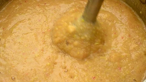 Saving a wasp from jam prepared with an immersion blender Stock Footage 88307102