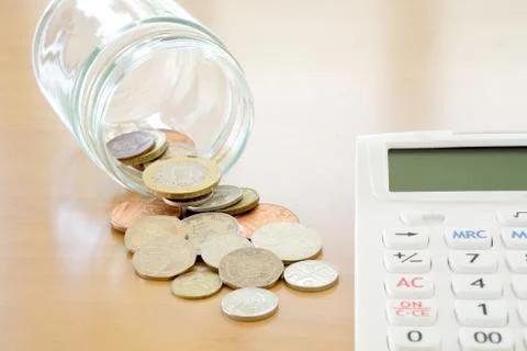 Savings Jar and British Coins Stock Photos