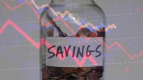 Savings Jar with Falling Red Graph and Financial Crisis Stock Footage 336478544