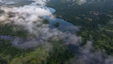 Savitri River Backwaters through clouds near Poladpur, Maharashtra, India 動画素材 320555143