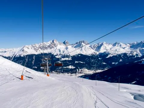 Savognin: region, snow-covered mountains and ski slopes Stock Photos