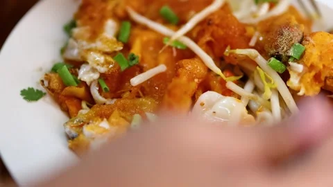 Savoring Crispy Pancake with Bean Sprouts Vídeos de archivo 308450762