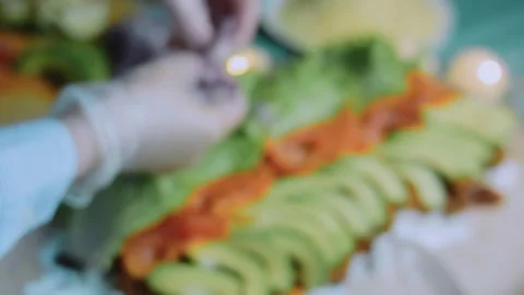 Savory cooking view: adding shredded cheese to a burrito Stock Footage 342167986