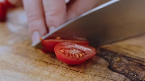 Savory finished meal angle: adding walnuts and spices to the sauce Stock Footage 342200961