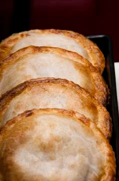 Savory pie filling served on a rectangular plate black Stock-Fotos
