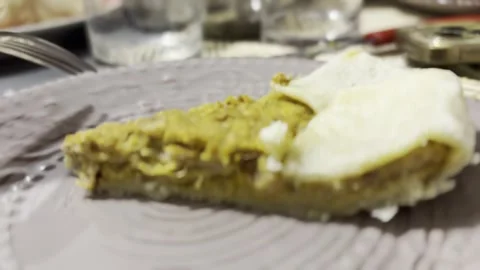 Savory Pie Slice on Patterned Plate 스톡 동영상 345339200