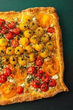Savory pie with tomatoes Stock Photos